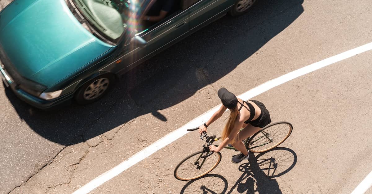 Bicyclist trying to avoid accident with car | Burg Simpson