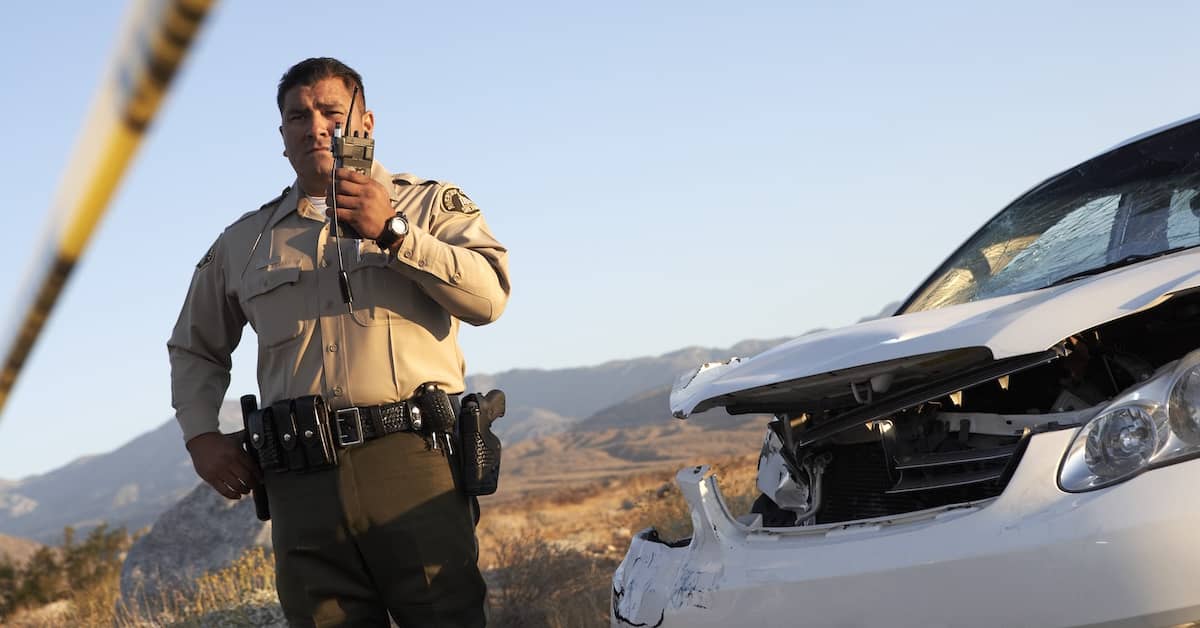 Arizona police officer responding to an accident | Burg Simpson