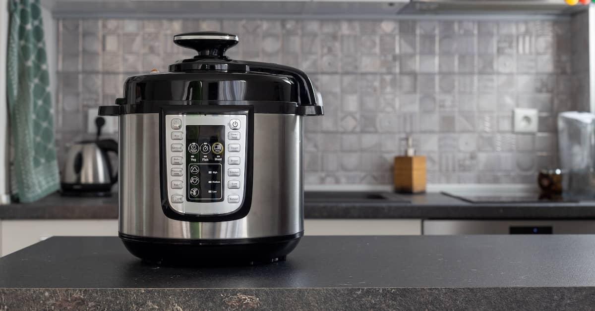 Pressure cooker/multi-cooker on kitchen countertop | Burg Simpson